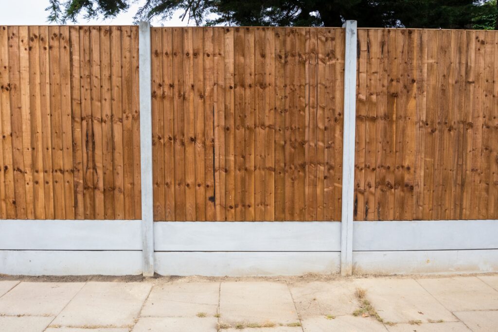 New,Wooden,Closeboard,Fence,Installation,Featuring,Concreate,Gravel,Boards Fencing a carpark in Chester.