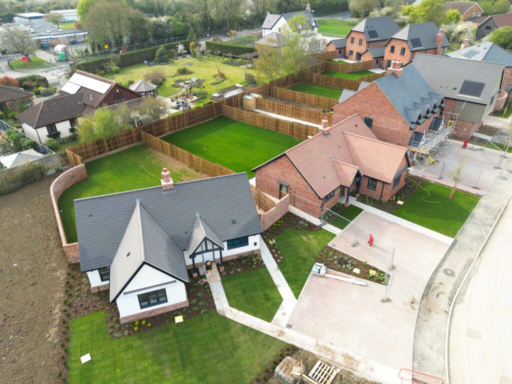 Drone,View,Of,Newly,Completed,Bungalows,Seen,In,A,Housing Newly laid lawns
